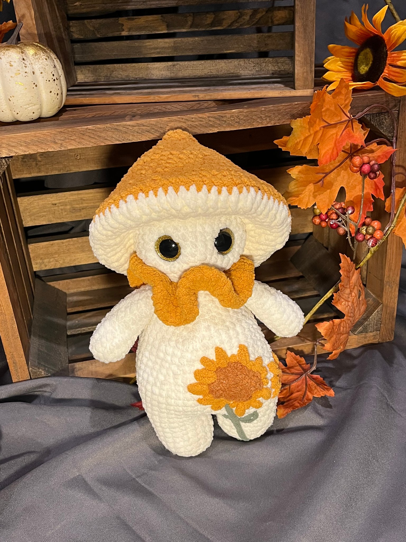 Handcrafted sunflower colored mushroom plushie